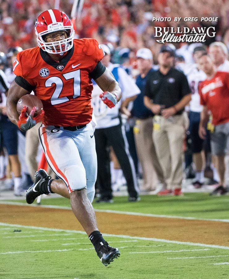 Nick Chubb (27) breaks off a big run during the UGA-Samford game - Athens, GA, Saturday, Sept. 16, 2017 -