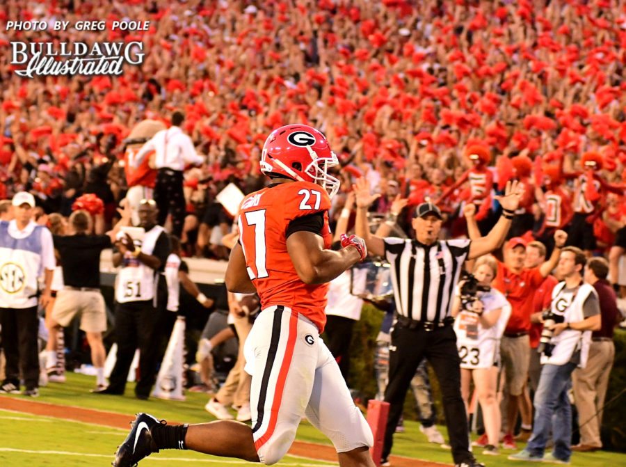 Georgia's Nick Chubb takes the handoff 7-yards into the endzone for a touchdown, putting UGA up 14-0 over Mississippi State in the first quarter. - Saturday, Sept. 23, 2017 -