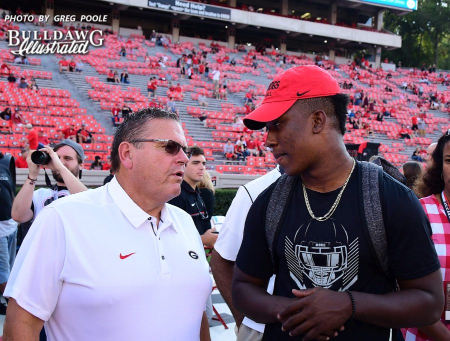 Georgia O-line coach Sam Pittman (left) with 2018 DE prospect KJ Henry (right) - UGA vs. Mississippi State game - Saturday, September 23, 2017