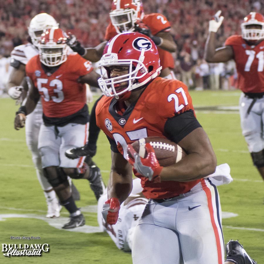 Nick Chubb (27) rushes 28 yards out of the "Wild Dawg" for six in the third quarter of the UGA-Mississippi State game. - Saturday, Sept. 23, 2017 -