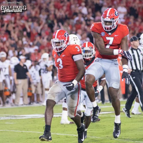 Linebackers Roquan Smith (3) and Lorenzo Carter (7) and the Georgia defense come off the field victorious after stopping the Mississippi State offense on another drive - UGA vs. Mississippi State - Saturday, Sept. 23, 2017