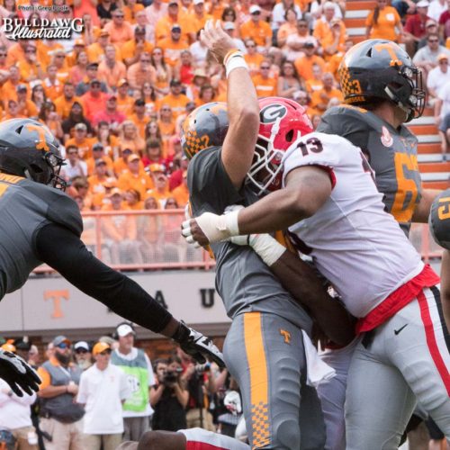 Jonathan Ledbetter (13) says "hello with a hug" to the Vol QB Quinten Dormady - 1st quarter, UGA vs. Tennessee - Saturday, Sept. 30, 2017
