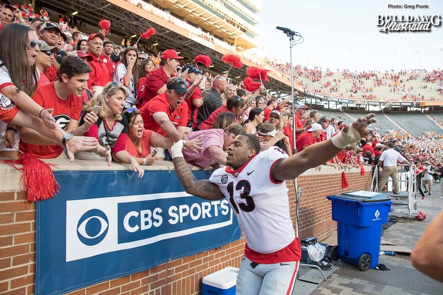 Jonathan Ledbetter (13) celebrates Georgia's 41-0 victory over Tennessee with Bulldog fans. - Saturday, Sept. 30, 2017 -