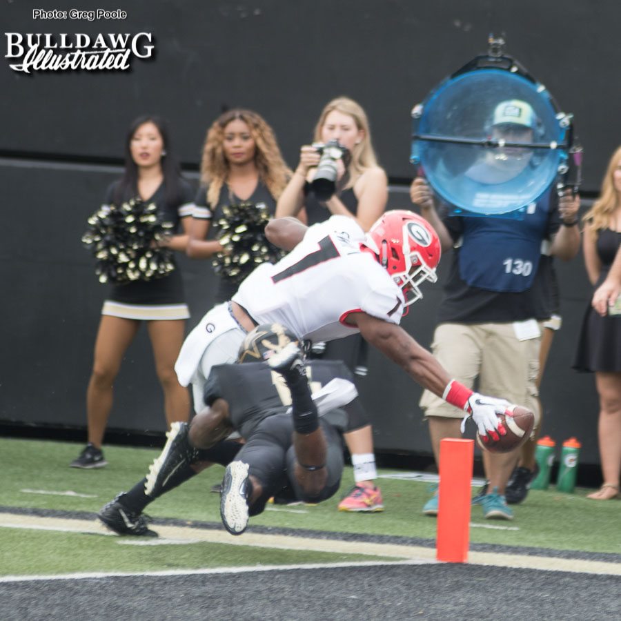 D'Andre Swift (7) stretches for the pylon and goal line. Did the ball cross the plane before he stepped out? - UGA vs. Vanderbilt - Saturday, October 7, 2017