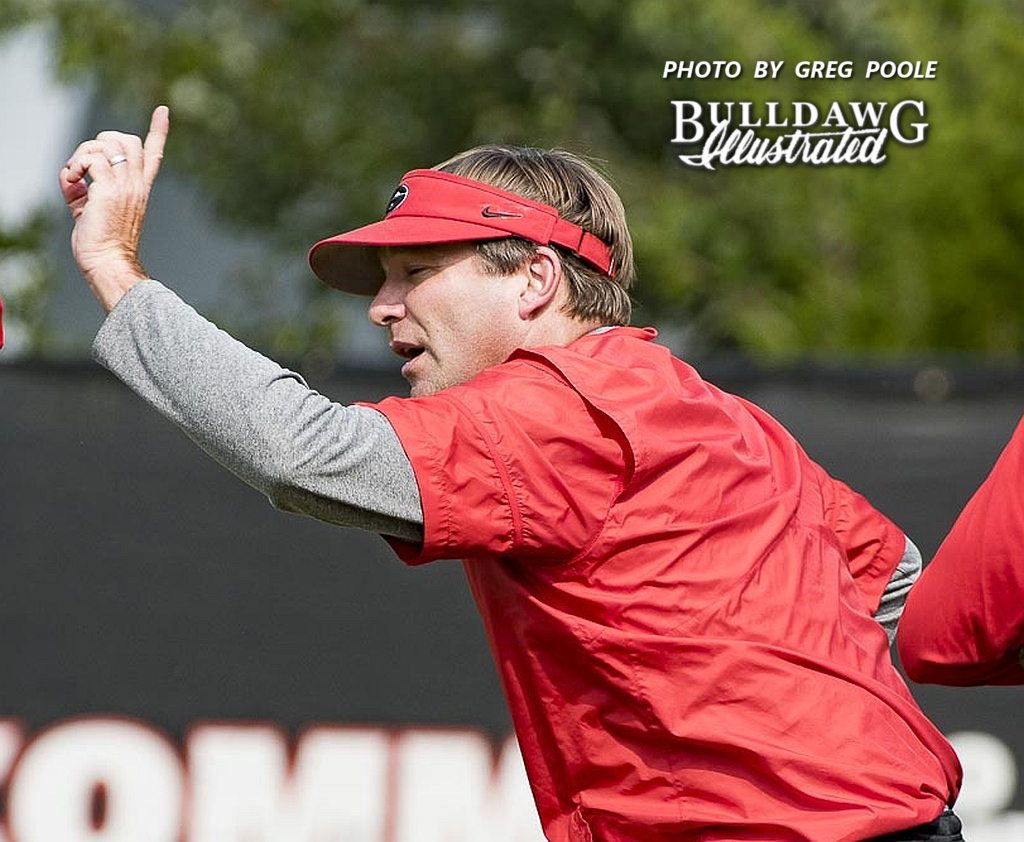Kirby Smart instructs players during practice
