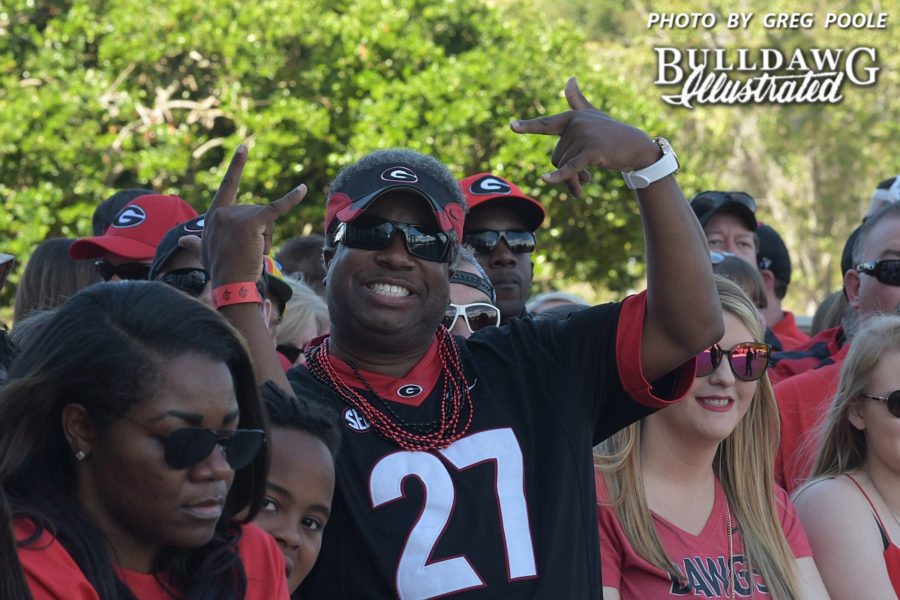 A Bulldog fan sports a Nick Chubb No. 27 jersey as he cheers on UGA football team players and coaches. - 2017 Georgia-Florida Dawg Walk - Saturday, Oct. 28, 2017