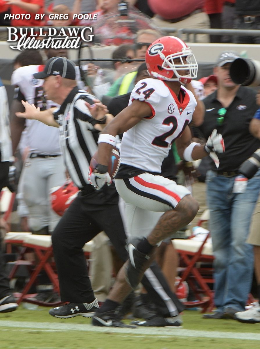 Dominick Sanders (24) with the interception and the return during the Georgia-Florida game, Saturday, Oct. 28, 2017.