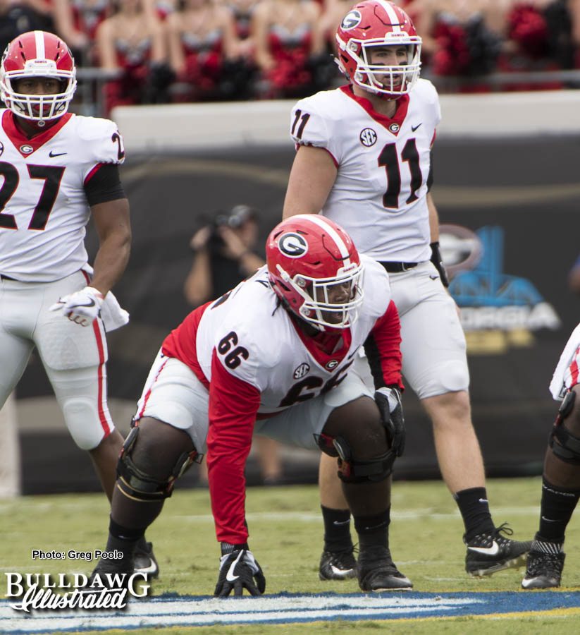 Solomon Kindley (66) looks for a Gator to maul for Jake Fromm (66) and Nick Chubb (27)
