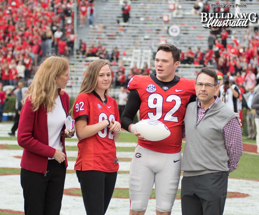 Punter Cameron Nizialek with his family being honored on Senior Day at Georgia vs. Kentucky on Saturday, Nov. 18, 2017.