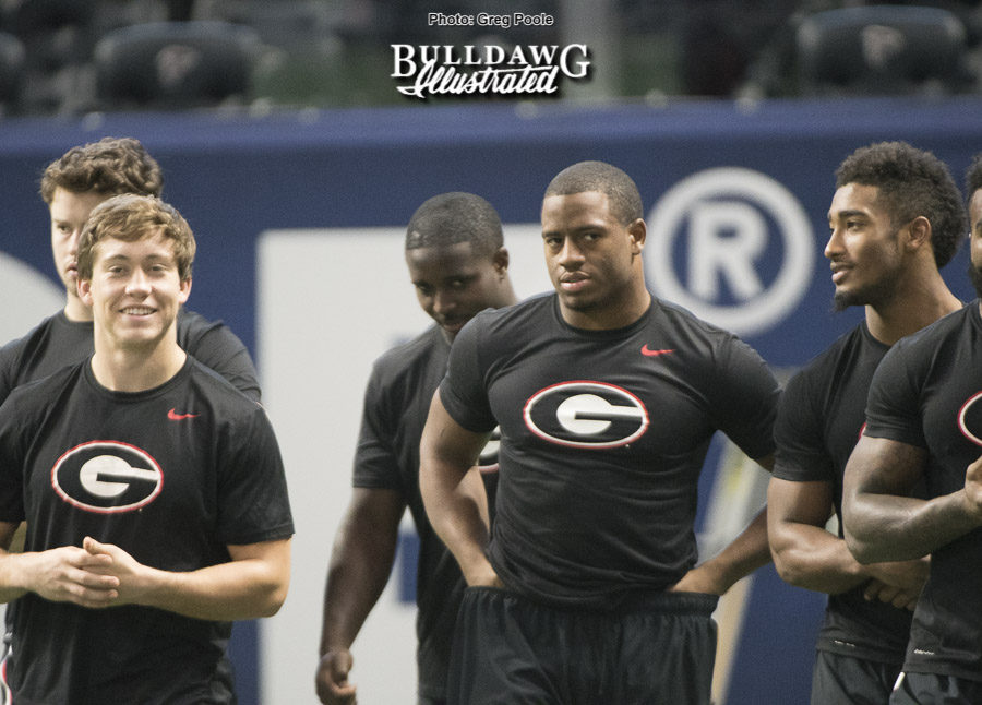 Prather Hudson (left) and Nick Chubb (right) along with the rest of the Georgia running backs group in a team walk through of the Mercedes-Benz Stadium on Friday, Dec. 1, 2017.