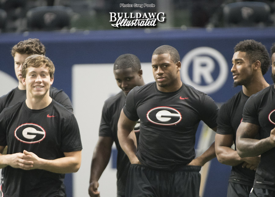 Prather Hudson (left) and Nick Chubb (right) along with the rest of the Georgia running backs group in a team walk through of the Mercedes-Benz Stadium on Friday, Dec. 1, 2017.