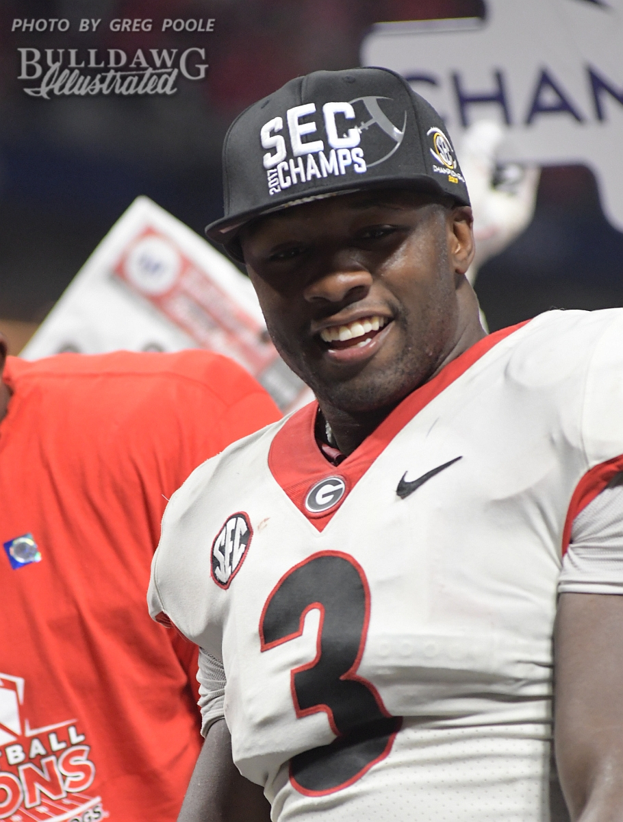 Roquan Smith got his 2017 SEC Champion's hat on and a big Bulldog smile on the podium after Georgia defeats Auburn 28-7 on Saturday evening in the Mercedes-Benz Stadium to grab the conference crown.