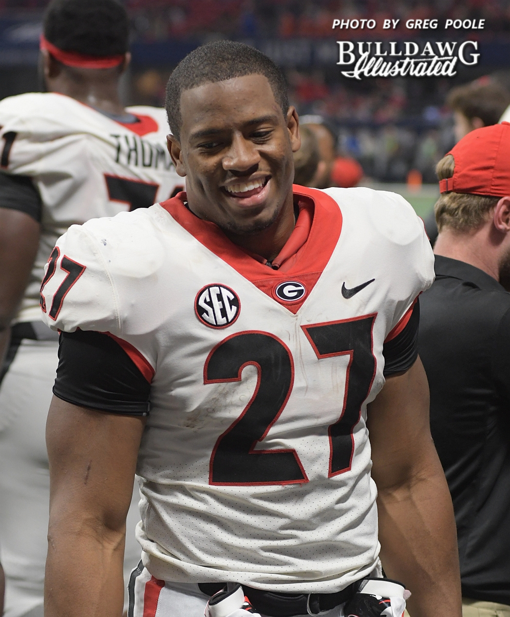 Georgia running back Nick Chubb with a smile in the waining moments of the 2017 SEC Championship game as the Bulldogs lead Auburn 28-7 - Saturday, Dec. 2, 2017 -