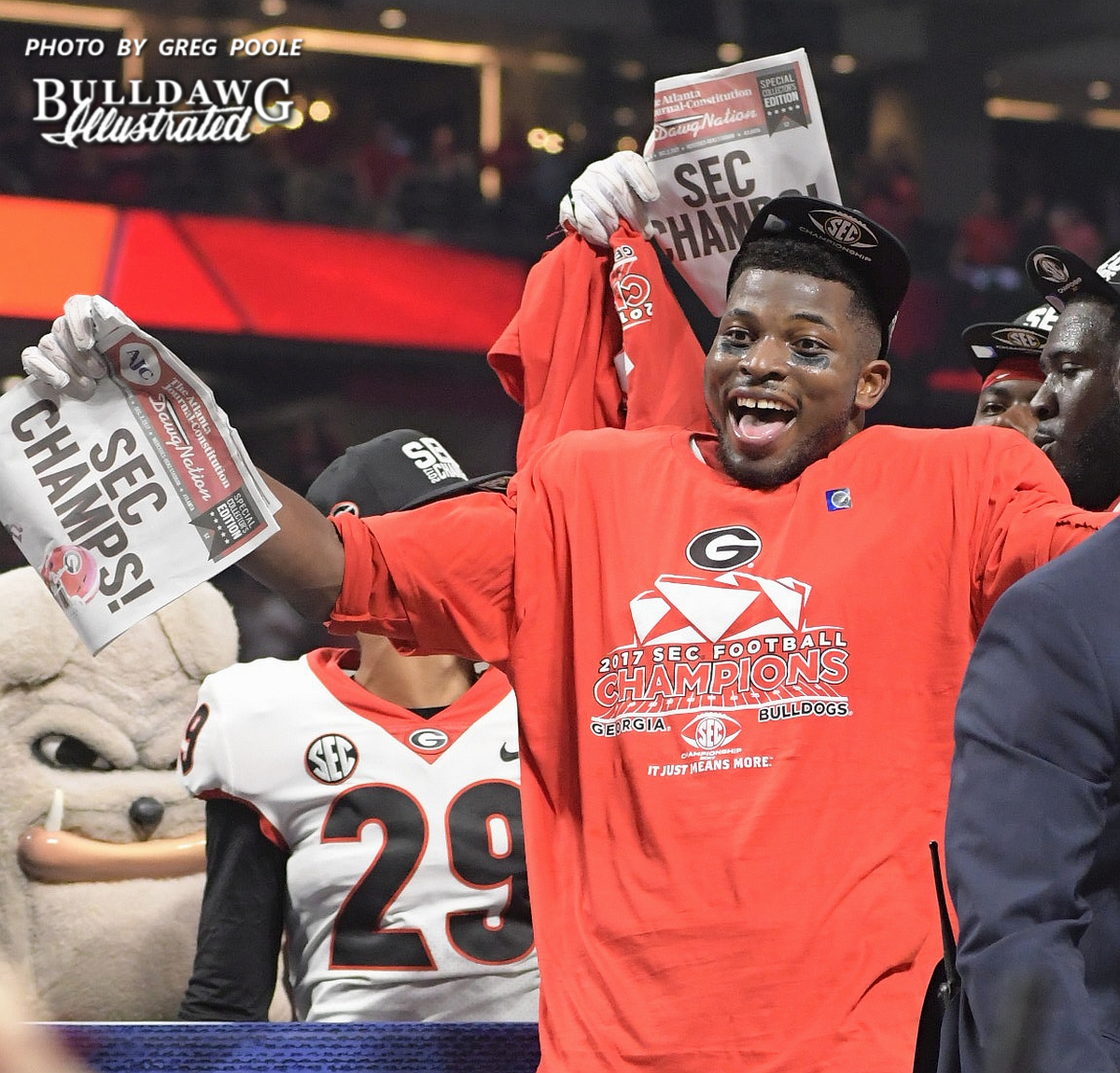 Lorenzo Carter celebrates with the Georgia football celebrates it's 28-7 victory over rival Auburn in the 2017 SEC Championship to earn the conference crown and title.