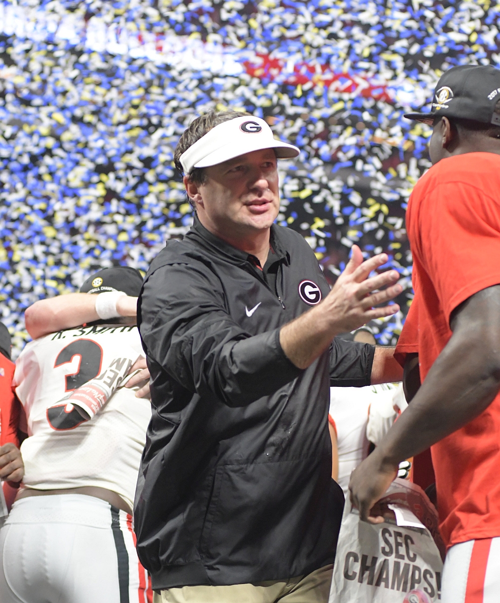 Kirby Smart celebrates the SEC Championship with his Bulldogs