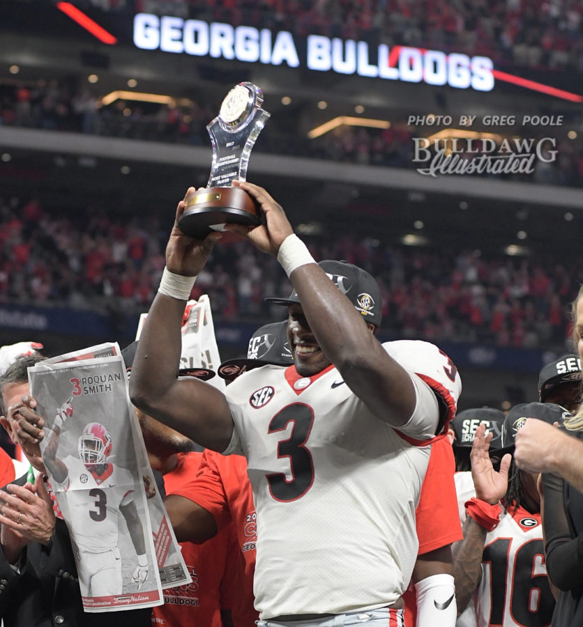 Roquan Smith receives the MVP trophy for his outstanding defensive performance in the 2017 SEC Championship, where Georgia defeated Auburn 28-7. - Saturday, Dec. 2, 2017 - Mercedes-Benz Stadium, Atlanta, GA -