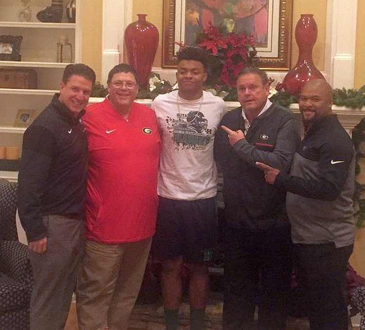 UGA WR Coach James Coley, Offensive Coordinator Jim Chaney, 2018 QB commit Justin Fields, O-Line Coach Sam Pittman, and RB Coachc Dell McGee. (Photo from Justin Fields / Twitter)