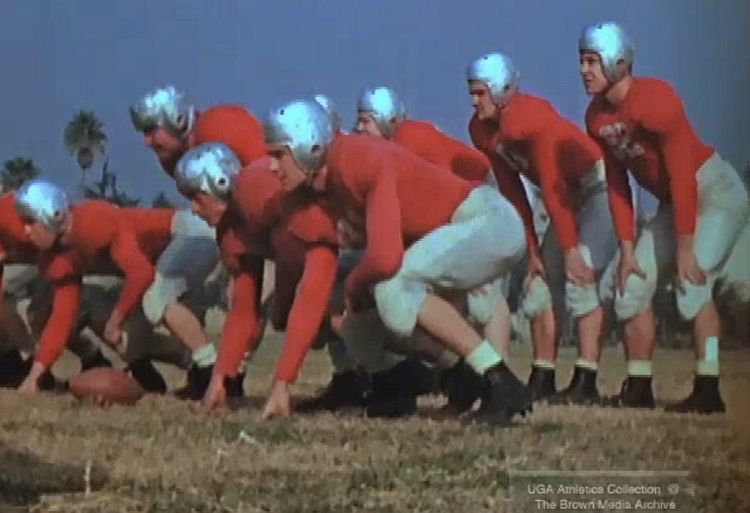 1942 UGA football team gets in some practice and time in front of the press at the 1943 Rose Bowl, (photo from footage of the 1943 Rose Bowl from UGA Athletics Collection: The Brown Media Archive)