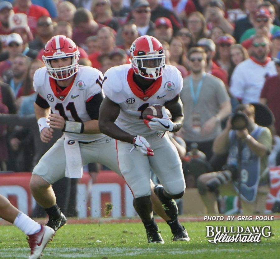 QB Jake Fromm (11) hands the ball off to RB Sony Michel (1) - Rose Bowl, 2nd quarter, Monday, Jan. 1, 2018 -