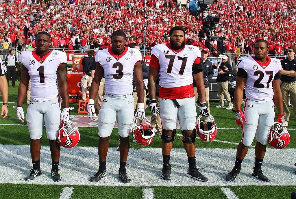 Rose Bowl Game Captains Sony Michel (1), Roquan Smith (3), Isaiah Wynn (77), and Nick Chubb (27) - All four were selected within the first two rounds of the 2018 NFL Draft<br /> (Photo by Rob Saye)