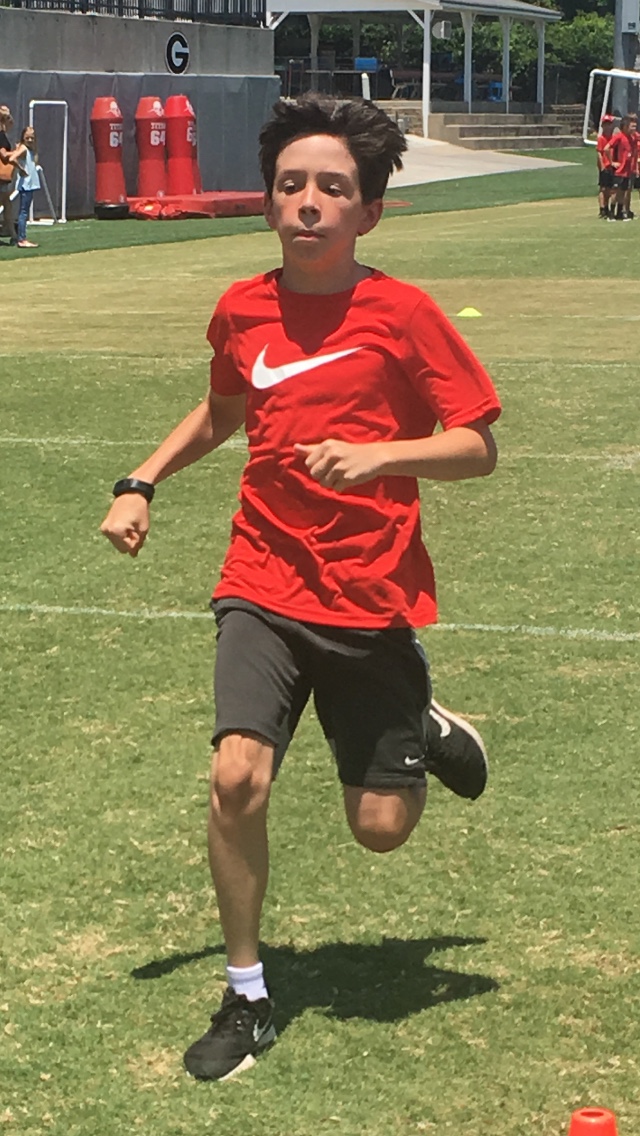 Wade Coleman (11) - Running Back - Sprinting through the finish of his 40-yard dash at camp registration.