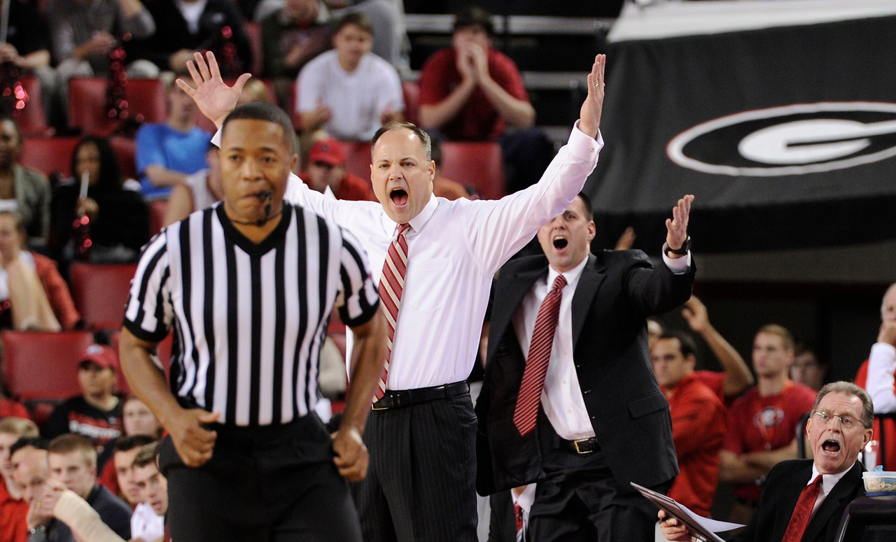 Georgia coaches react to a no call foul during an NCAA men's basketball game between the University of Mississippi and the University of Georgia on Tuesday, January 20, 2015 in Athens, Ga. (Photo by John Kelley)