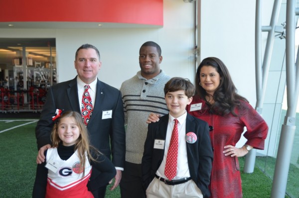 Brooke, Leon, Beau and Rebecca Farmer with Nick Chubb