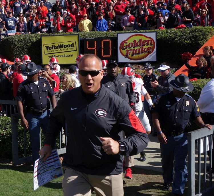 Coach Mark Richt leads Georgia team out of the tunnel UGA vs. Auburn 14-Nov-2015 (Photo by Bulldawg Illustrated's Greg Poole)