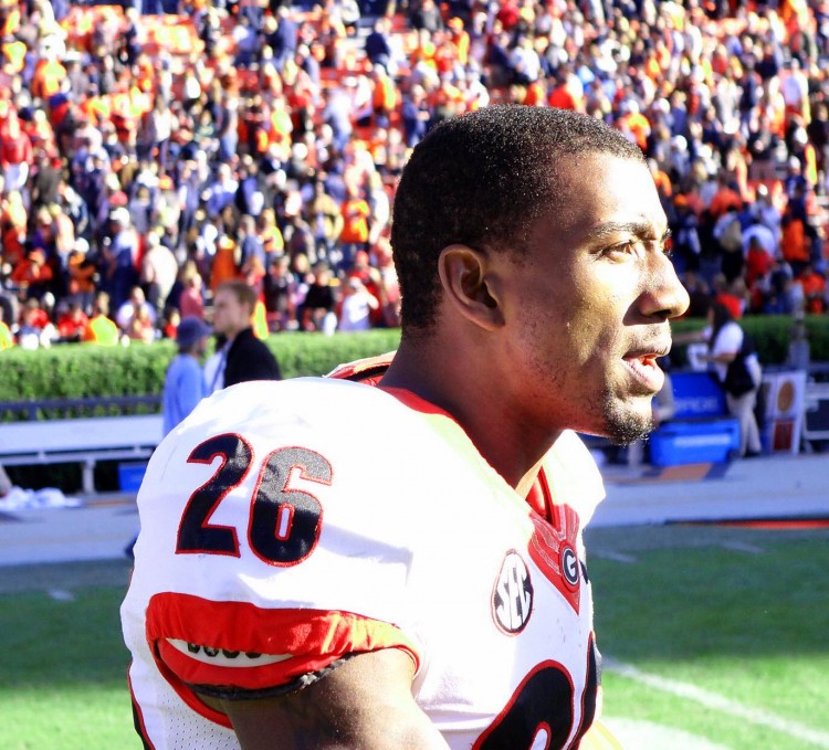 Malcolm Mitchell congratulates a teammate