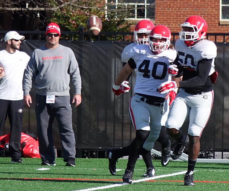 Rip, scoop and score drill as Coach Sherrer looks on