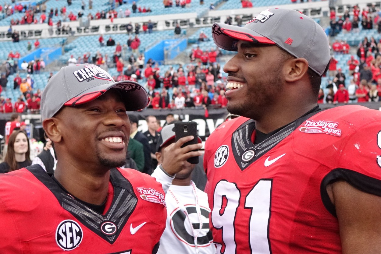 Terry Godwin and Josh Dawson - TaxSlayer Bowl post-game 02-JAN-2016 (Photo by Bulldawg Illustrated's Greg Poole)