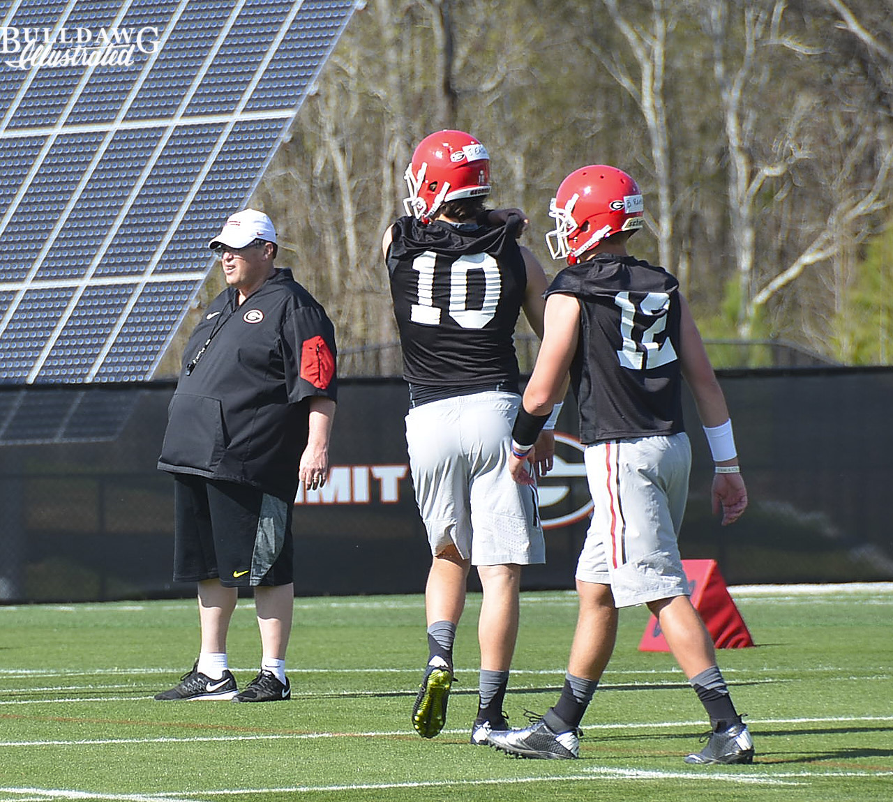 Jacob Eason (10) and Brice Ramsey repping under the gaze of OC Jim Chaney