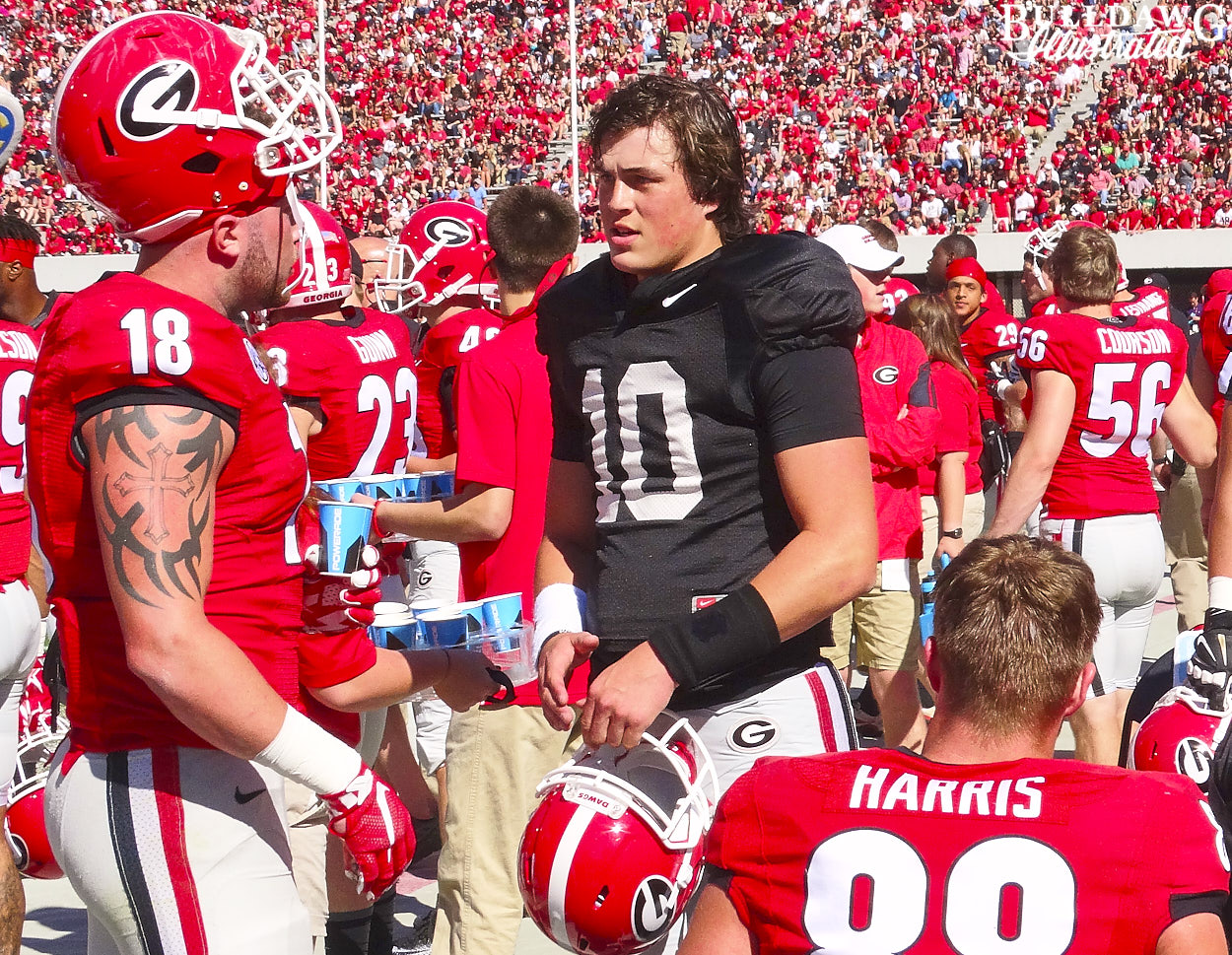 Jacob Eason (10), Isaac Nauta (18) and Jackson Harris (88)