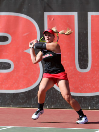 Kennedy Shaffer hits the ball during a singles match during an NCAA match between Georgia and Virginia on Thursday, March 17, 2016, in Athens, Ga. (Photo by Emily Selby)