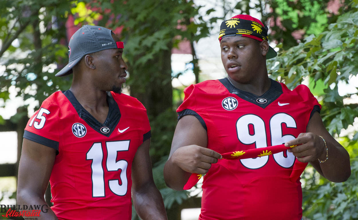 D'Andre Walker (15) and DaQuan Hawkins (96)