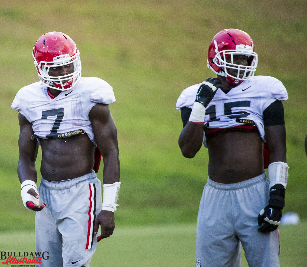 Lorenzo Carter (7) and D'Andre Walker (15)