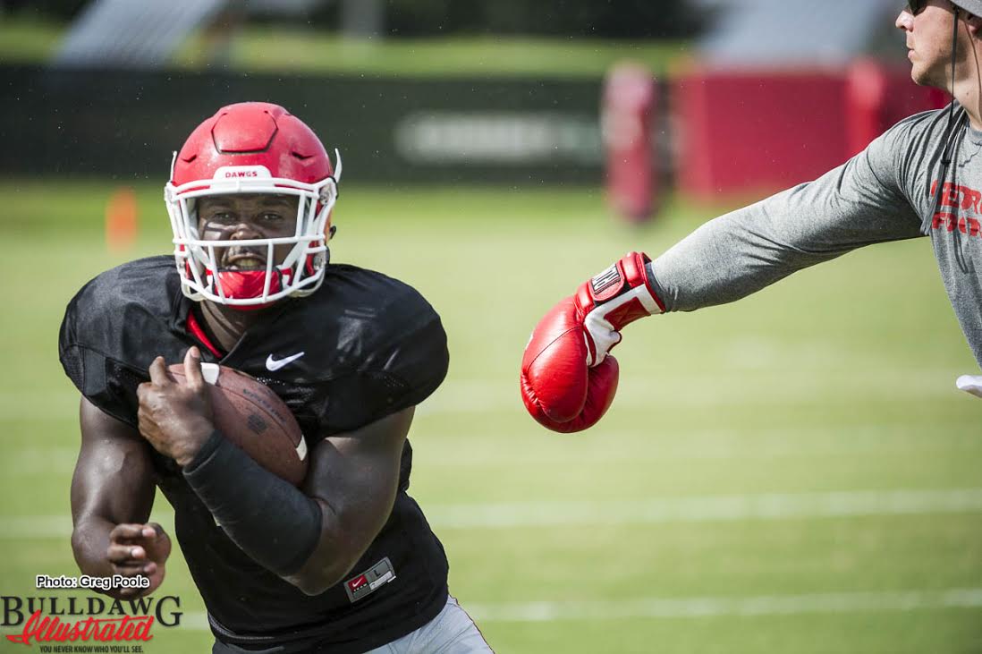 RB Sony Michel goes through ball security drills during Tuesday's practice