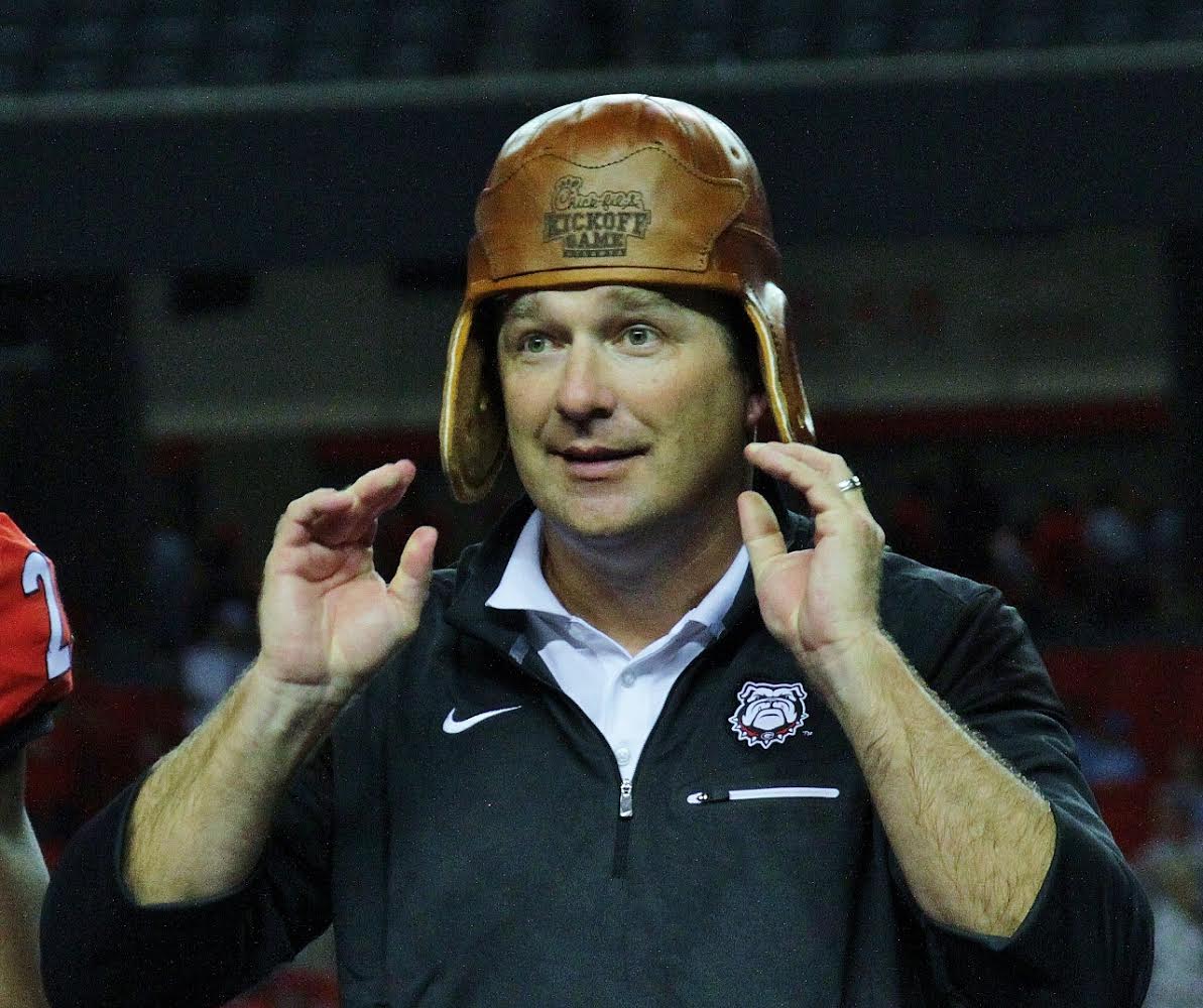 Kirby Smart dons the leather helmet