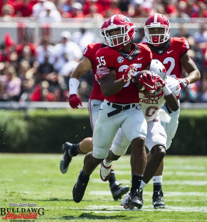 Georgia freshman RB Brian Herrien (35) dragging NSU defender for a few extra yards