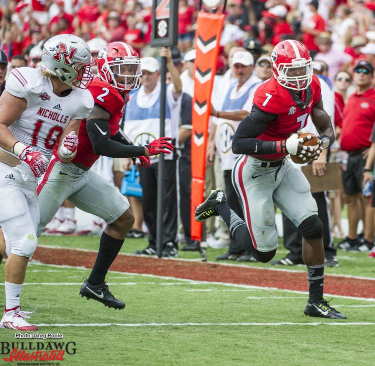 Lorenzo Carter is headed for the end zone with a fumble recovery vs. Nicholls State