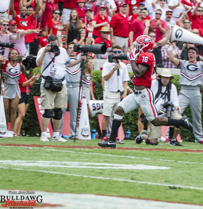 There goes Isaiah McKenzie (16) and... he gone