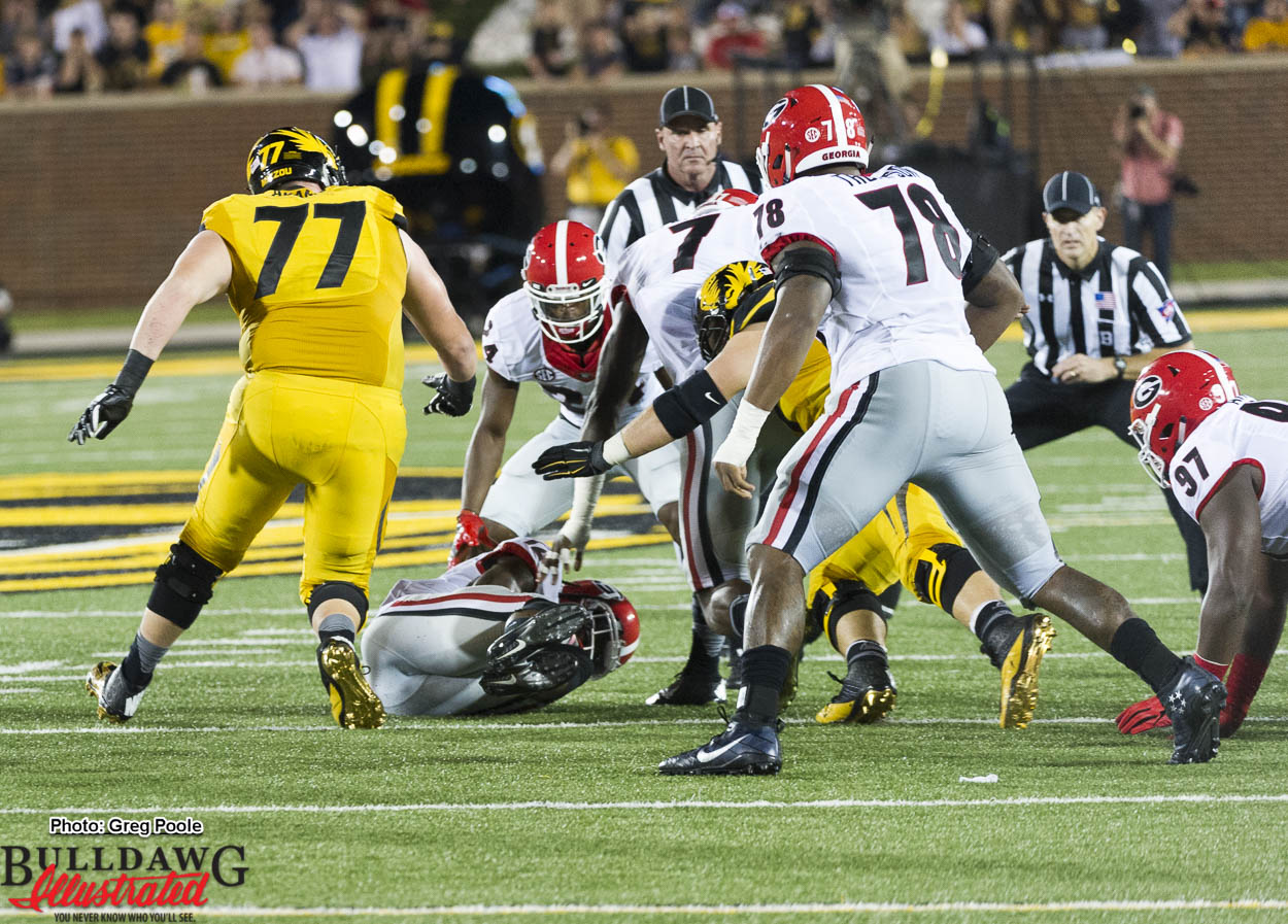 Juwan Briscoe (12) recovers fumble for Dawgs to seal the deal