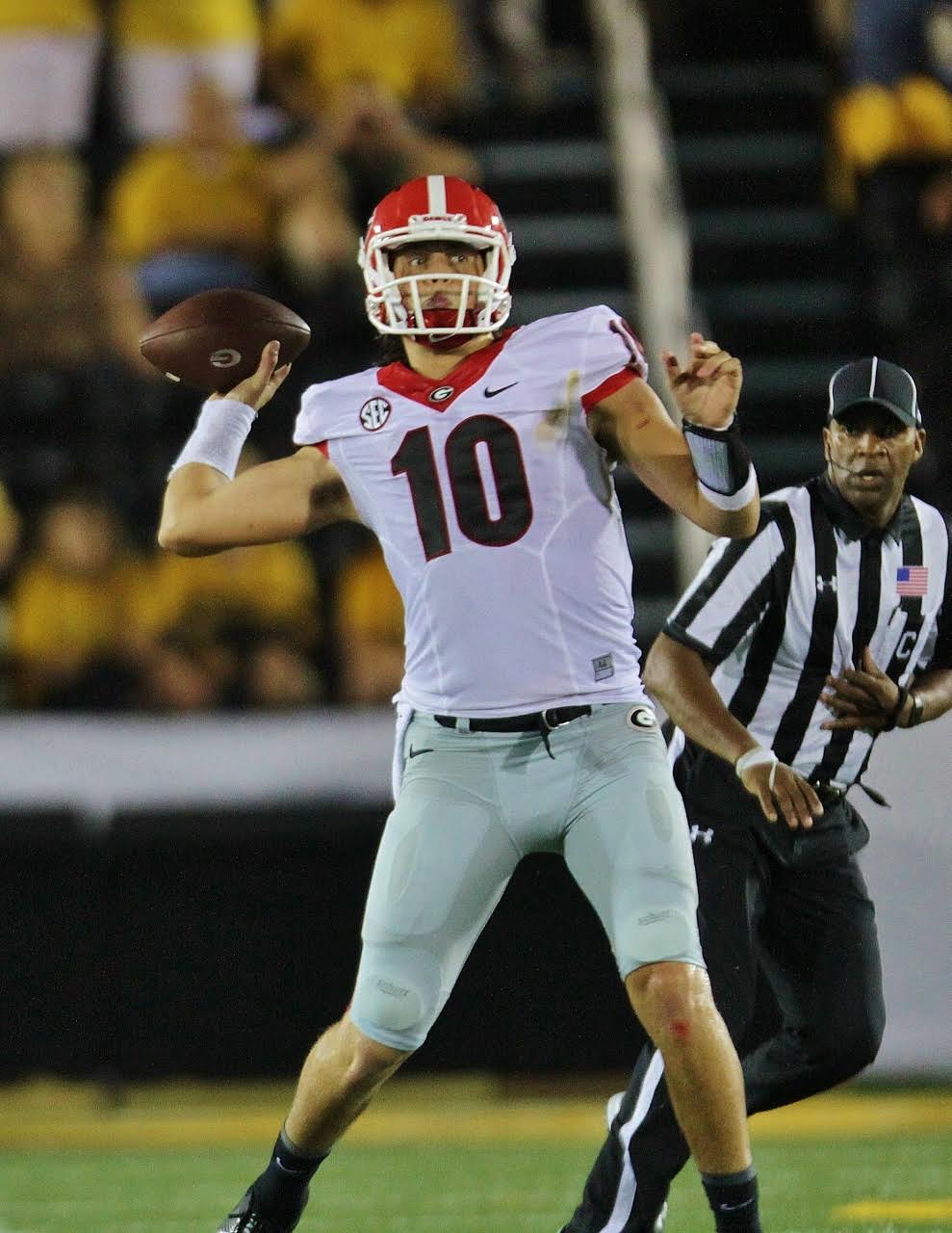 Jacob Eason drops back to complete one of his 55 pass attempts. (photo by Rob Saye)