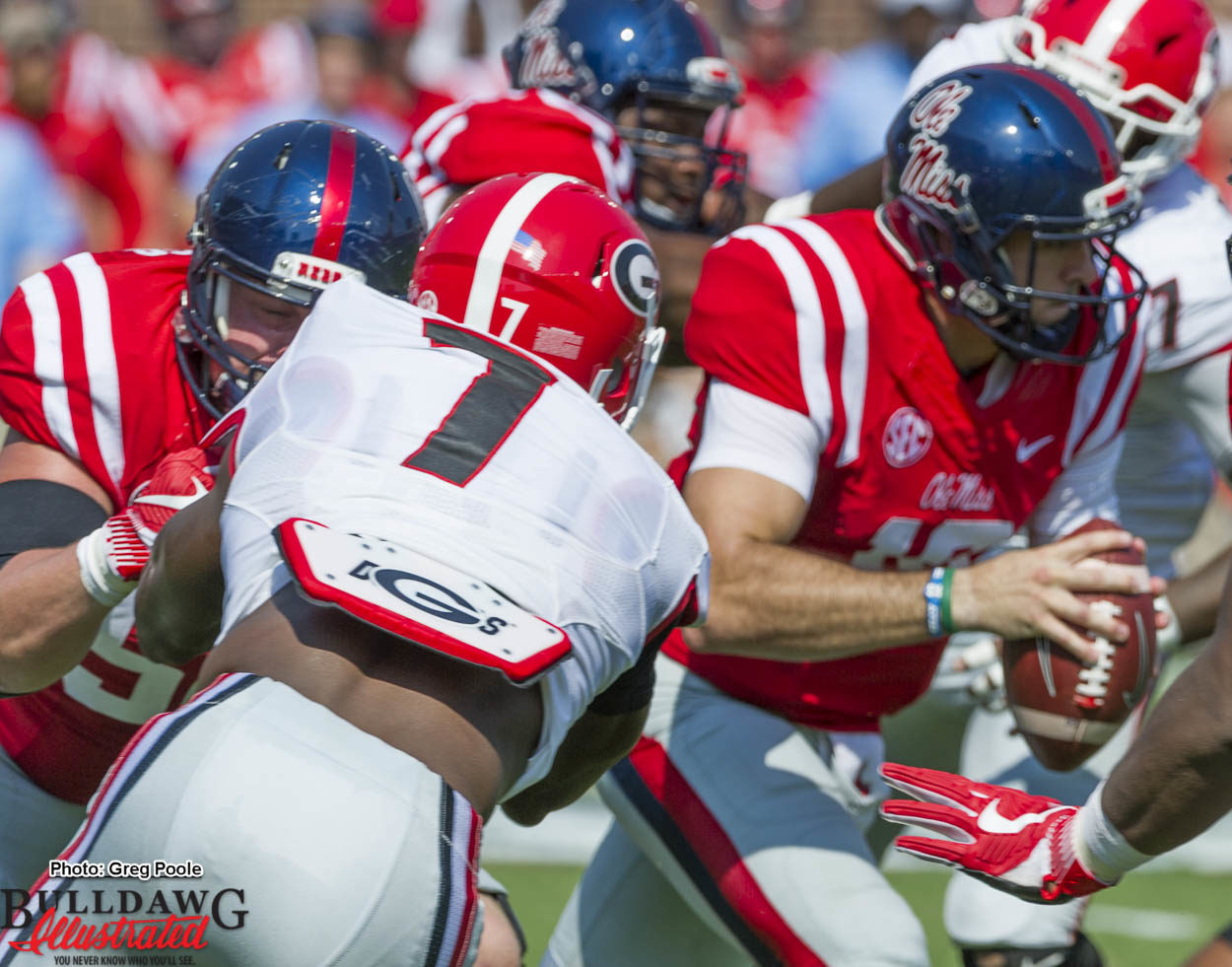 Lorenzo Carter (7) getting held a little