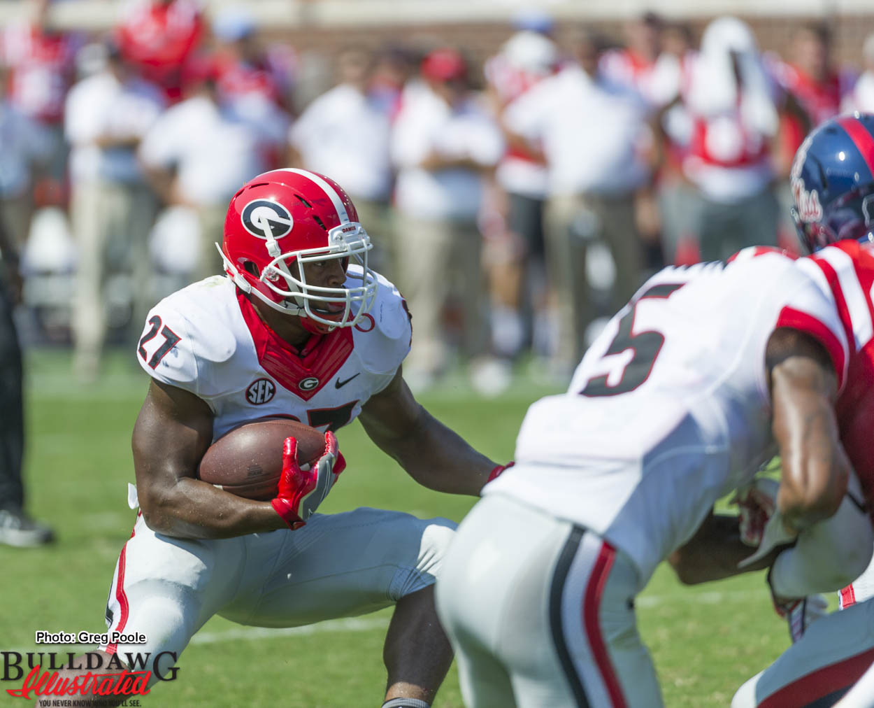 Nick Chubb (27) looks for some running room