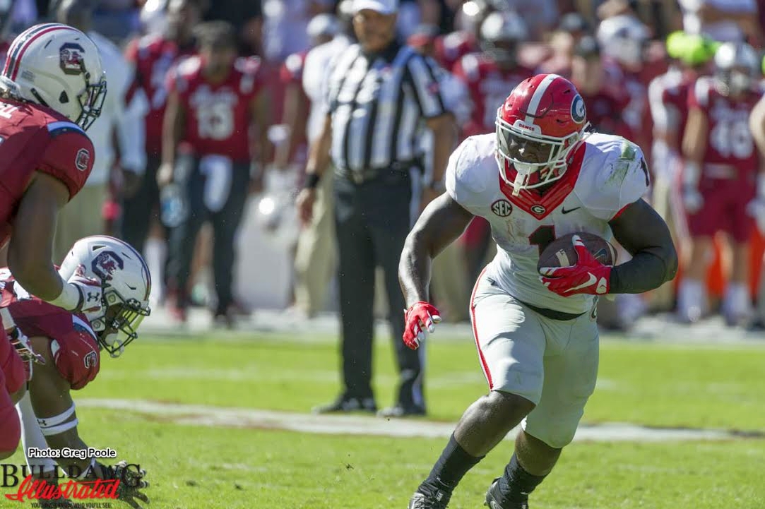 Sony Michel (1) running hard on his way to 133 yards on 21 carries