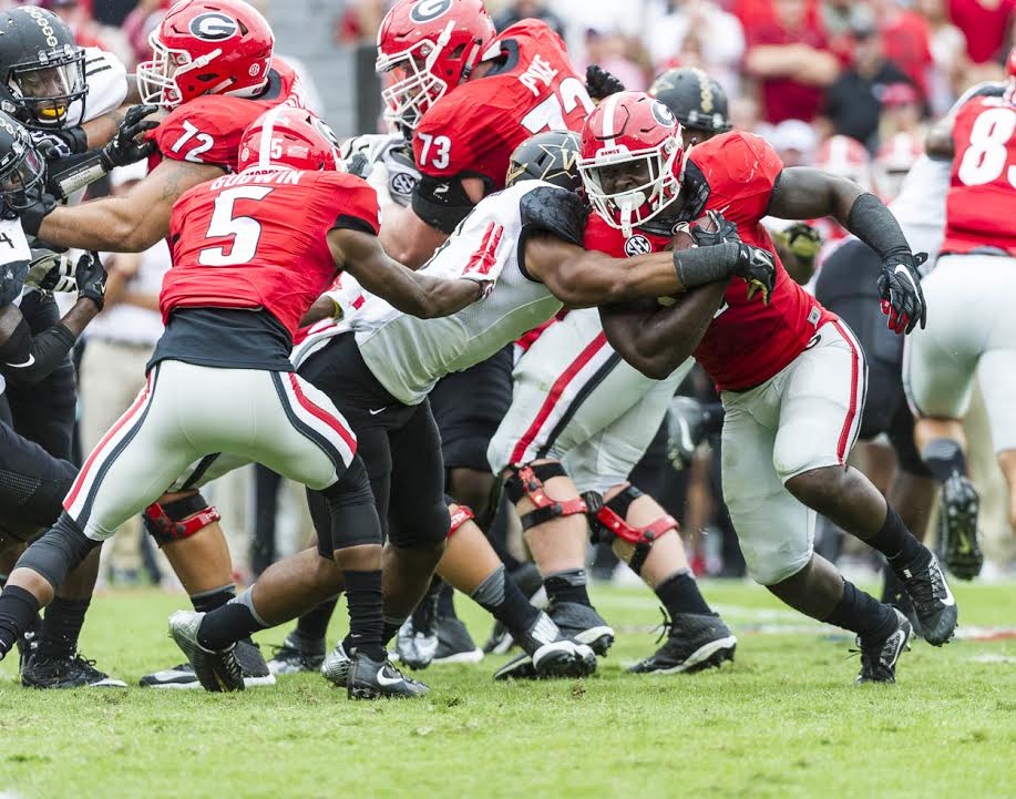 Tailback Sony Michel (1) fighting for every inch
