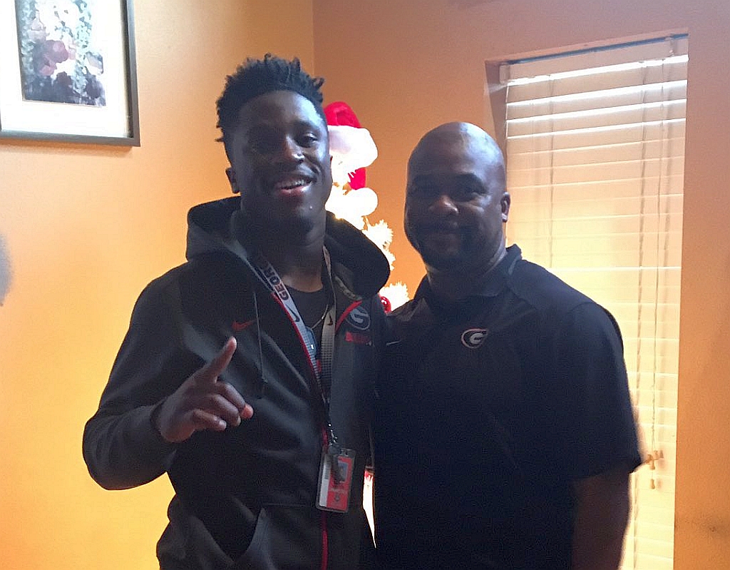 Toneil Carter with Georgia RB Coach Dell McGee (photo from Toneil Carter - Twitter)