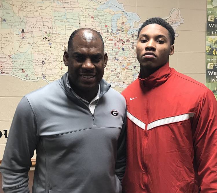 Georgia Defensive Coordinator Mel Tucker with Lonnie Johnson Jr. (photo from Lonnie Johnson Jr. - Twitter)
