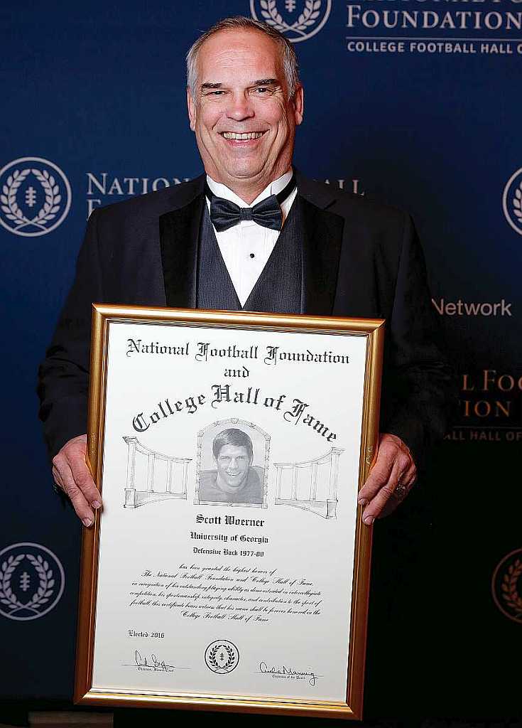 Scott Woerner with his College Foootball Hall of Fame plaque